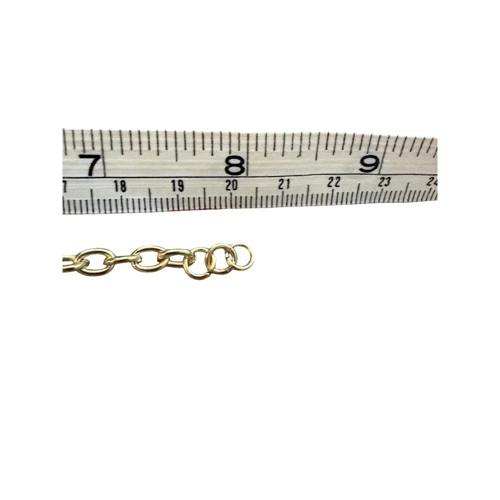 Diamonds International gold tone